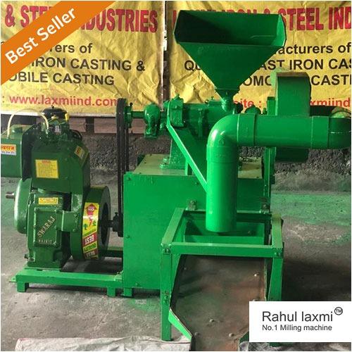 A compact Shera huller diesel engine-operated mini rice mill machine with a sleek green finish. The machine's distinctive green color not only adds a touch of modernity but also signifies its environmentally conscious design. The Shera diesel engine, depicted in the vibrant green context, highlights the powerful and efficient nature of this rice milling equipment. The green color theme suggests a commitment to sustainability and innovation, making it an ideal choice for eco-minded farmers. This mini rice mill machine combines functionality with a refreshing green aesthetic, embodying a harmonious blend of technology and environmental awareness