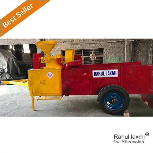 "Experience innovation and efficiency with the vibrant yellow and red Rahul Laxmi Sultan Tractor Operated Huller Mini Rice Mill Machine. The bold colors reflect the energy and power of this high-performance rice milling solution. Elevate your rice processing with the reliability and distinctiveness that the yellow and red color combination brings to the forefront, making a statement in both functionality and style."
