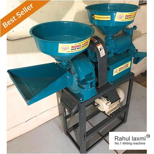 "A sleek and modern blue-hued mini rice mill machine seamlessly combined with a single-phase atta and masala chakki. This multifunctional unit efficiently processes grains and spices, offering a compact and stylish solution for small-scale milling needs. The vibrant blue color adds a touch of elegance to this powerful kitchen appliance, enhancing both form and function."